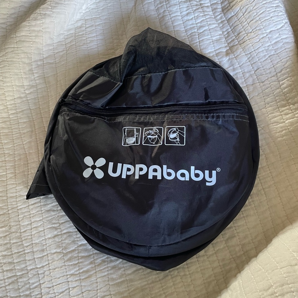 Uppababy cabana infant car seat weather shield.